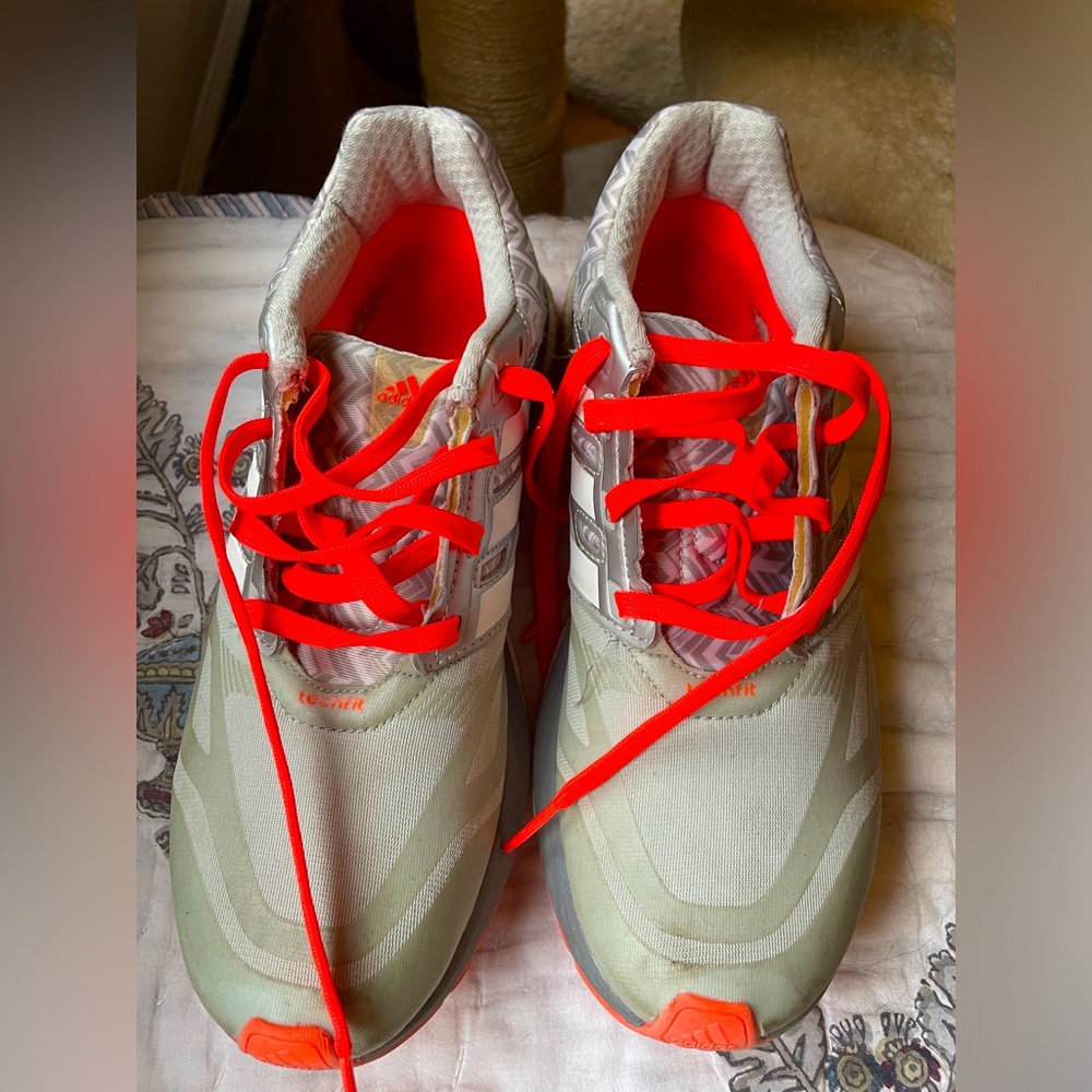 Adidas sneakers, sized 7.5. Gray with orange accents and laces.